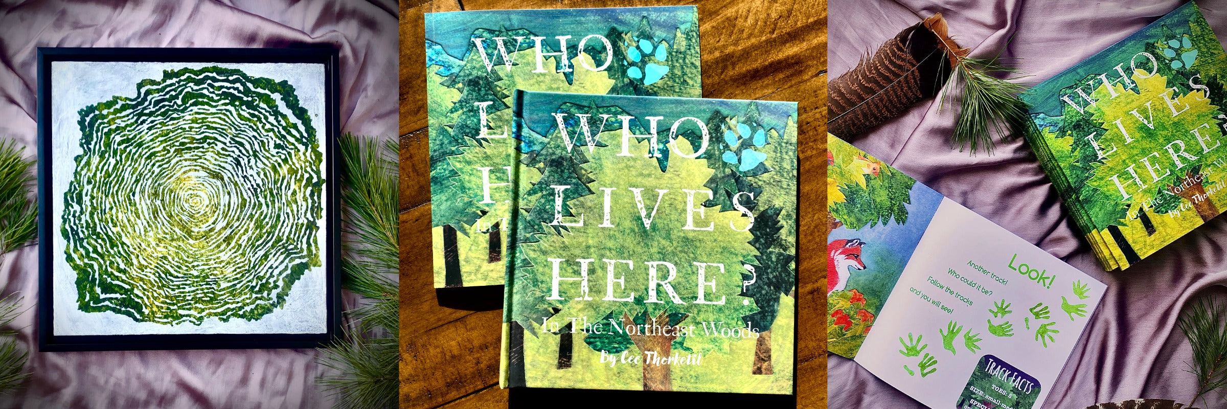 Collage of books and a framed artwork with nature-themed designs on a textured surface.